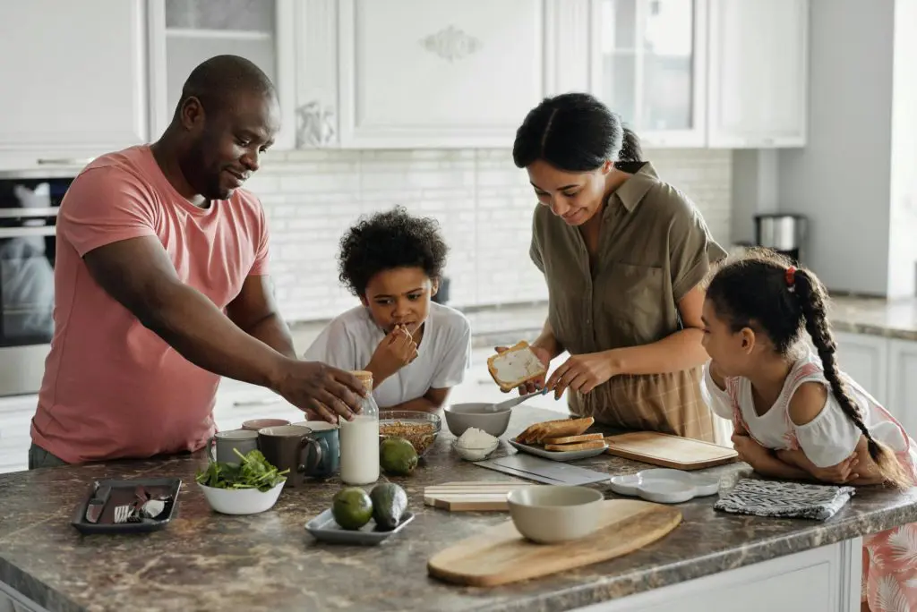 Family around a table eating breakfast