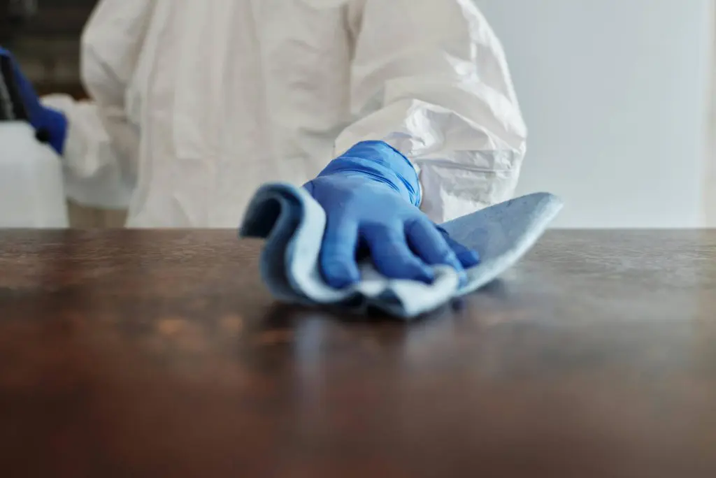 cleaning a table surface