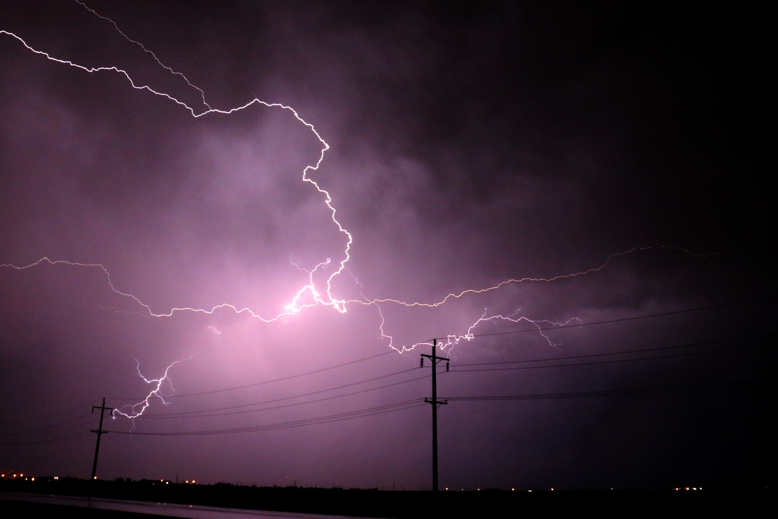 Lightning flashing across the night sky
