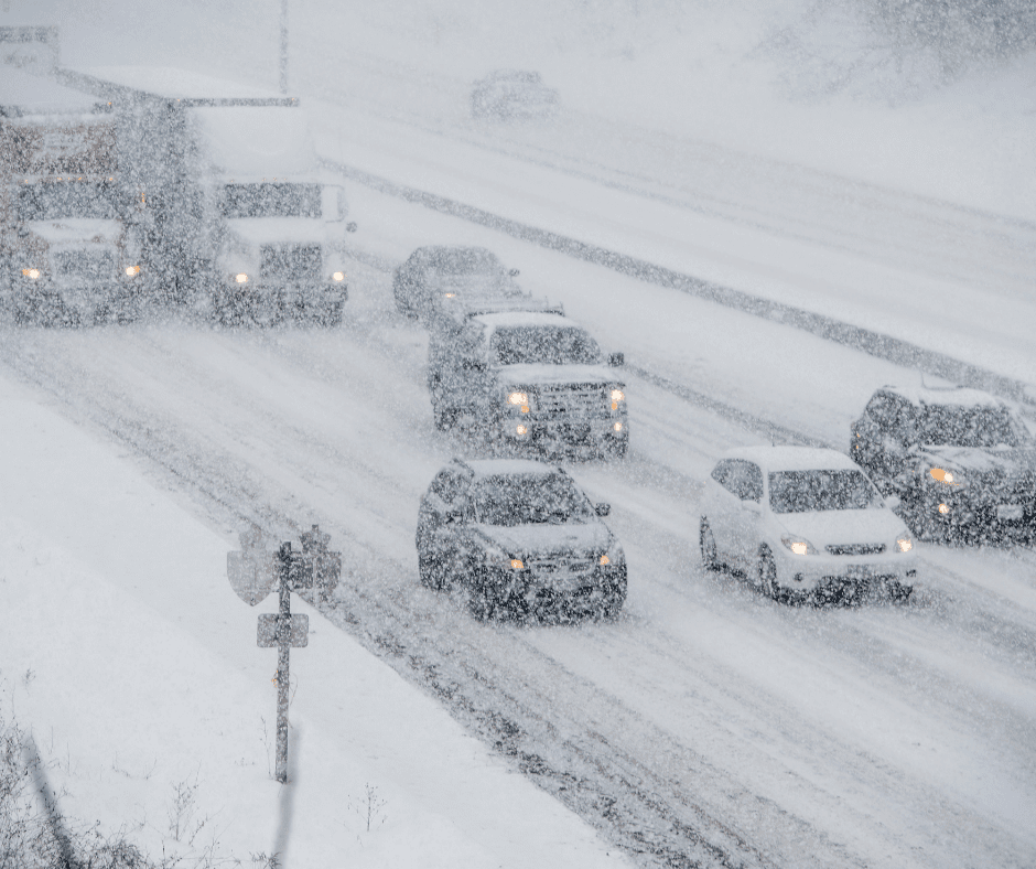 Cars driving on snow covered road